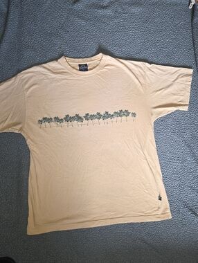 Mens Newport Blue Cream T-Shirt with Palm Tree Graphics.